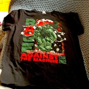 Very good quality kids size 12. Rage against the machine concert tee